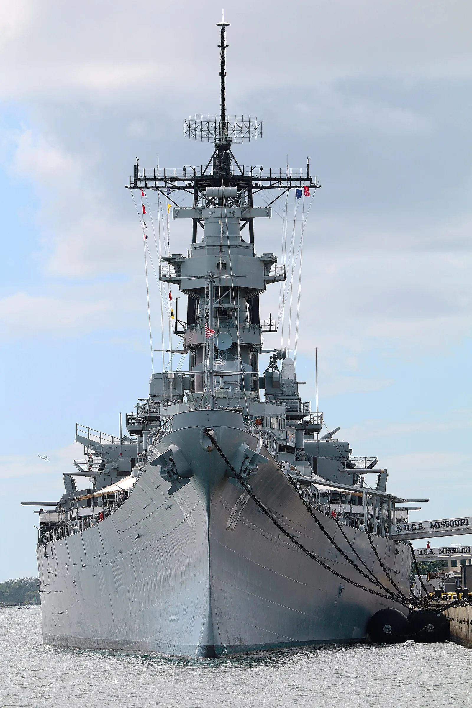 The bow and forward turrets of the battleship USS Missouri at its Ford Island berth