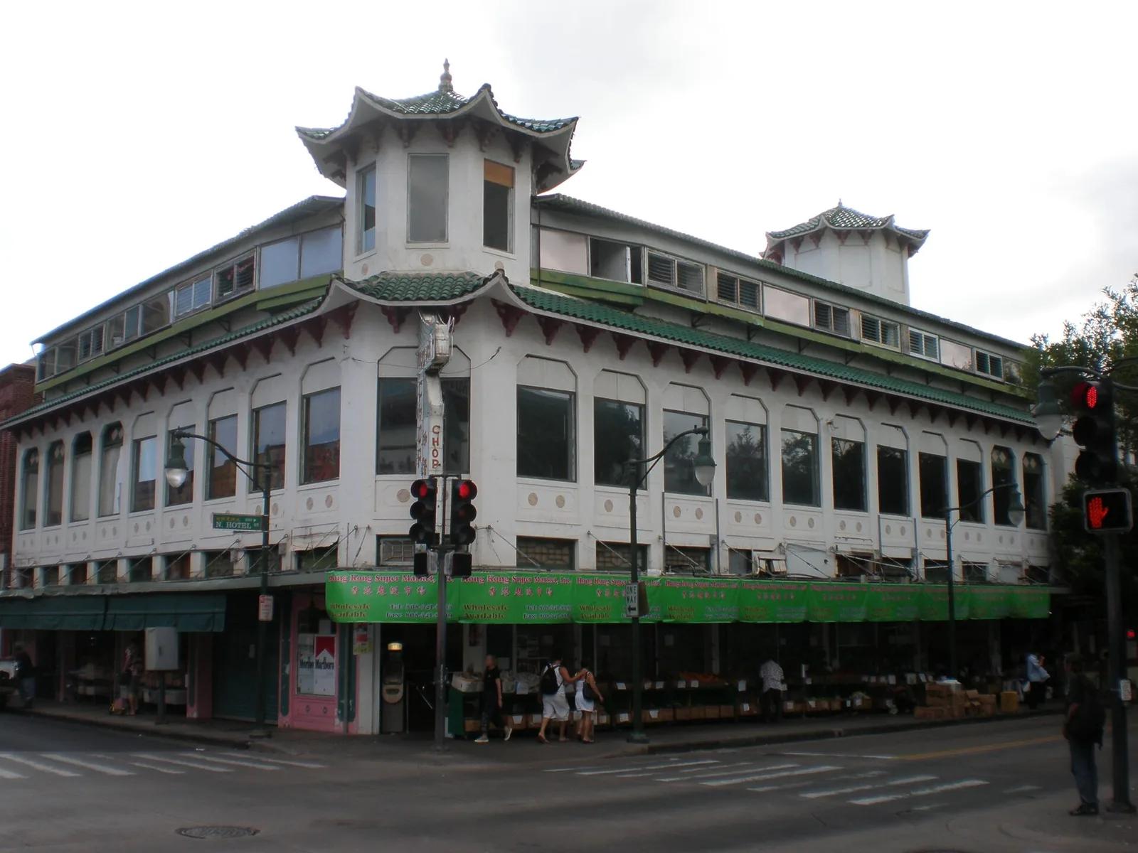 The pagoda-topped Wo Fat building on a street corner in Honolulu's Chinatown