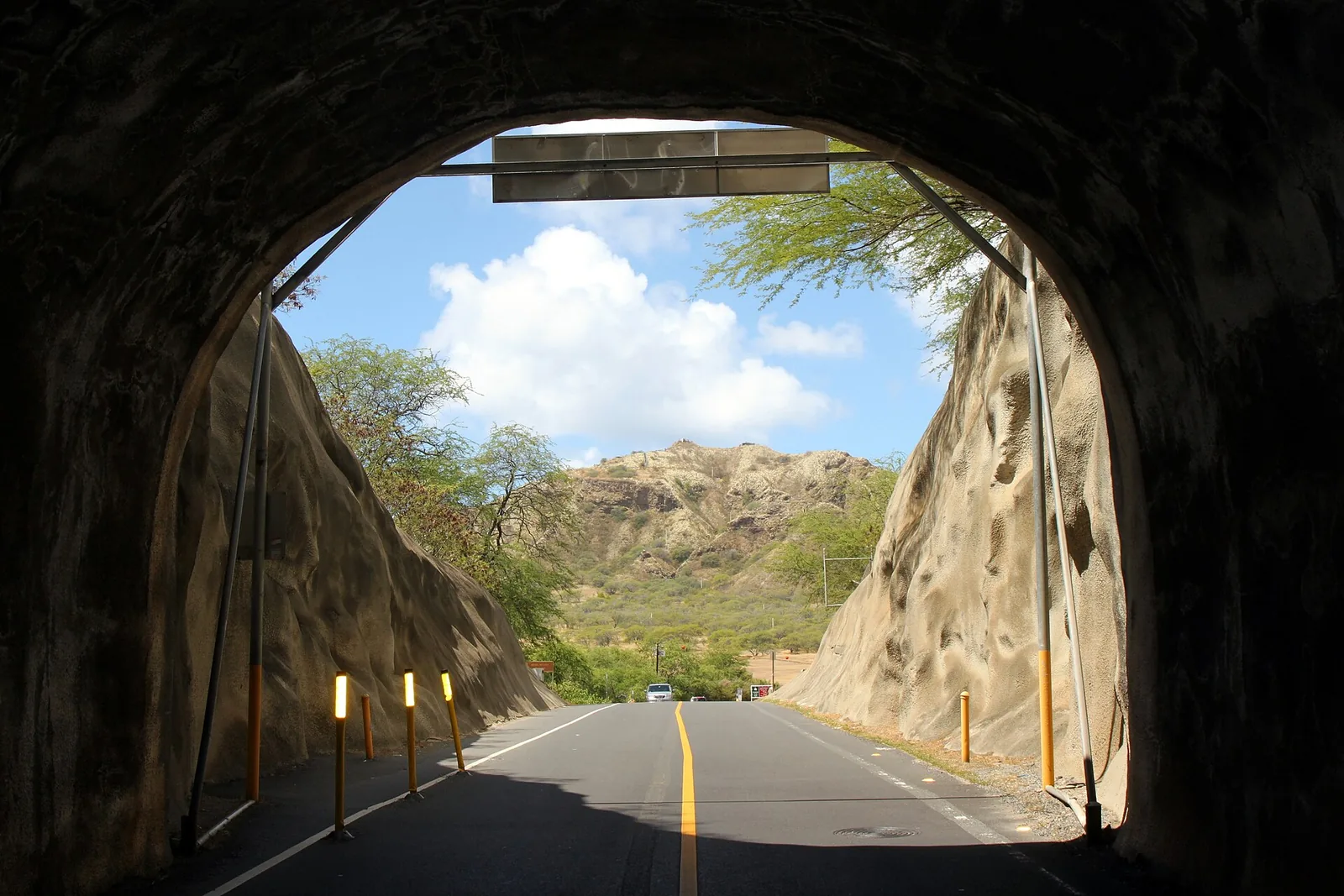 The road tunnel through the wall of Diamond Head crater, with the crater floor visible beyond