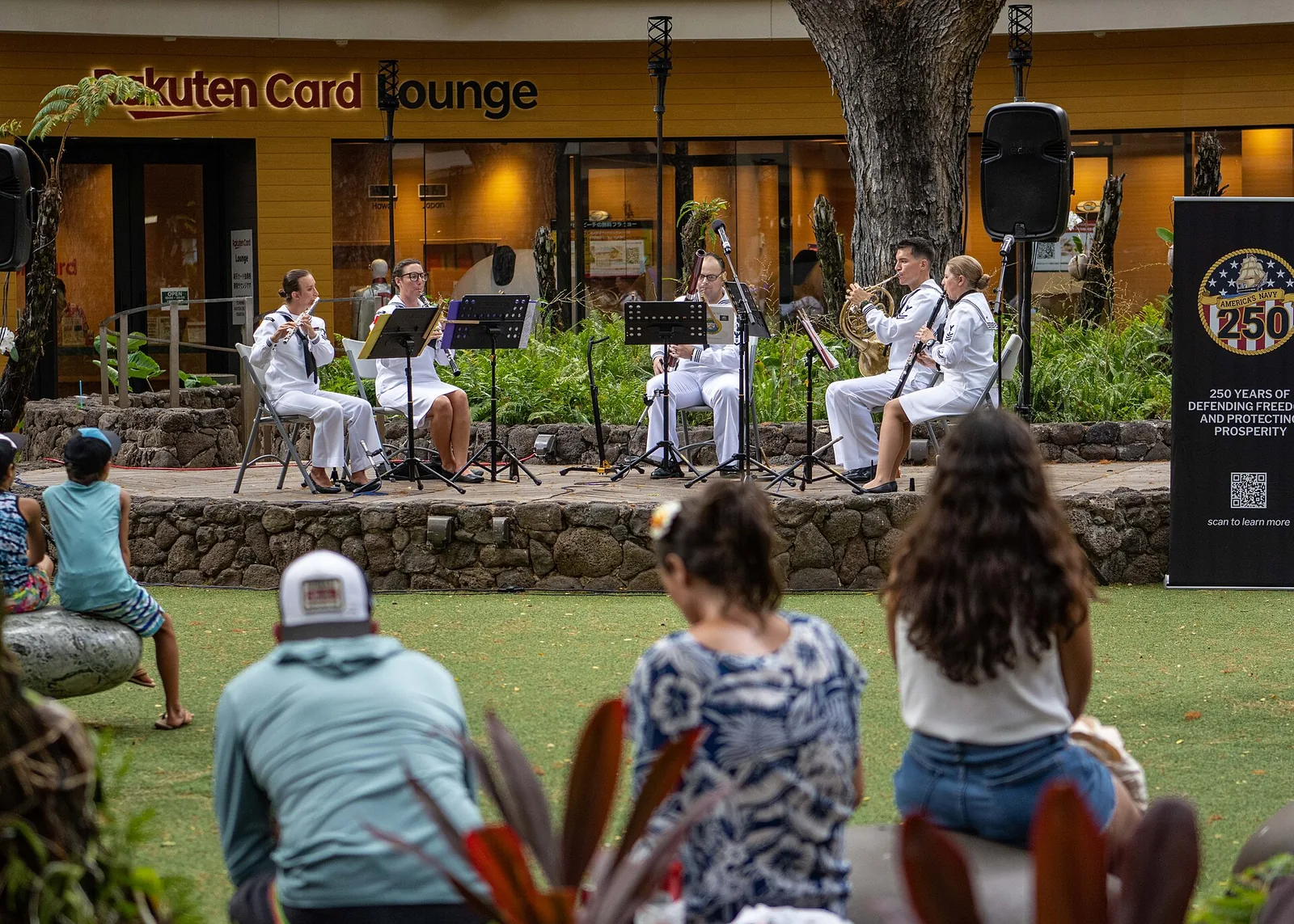 Musicians performing under the old banyan tree at the International Market Place in Waikiki